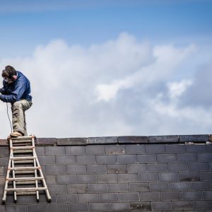 Man-on-roof-1 Man-on-roof-1